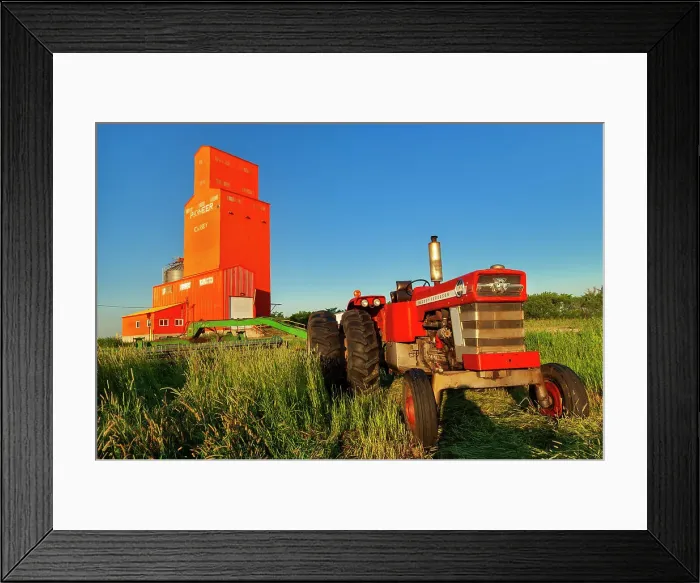 Framed Print : Grain elevator and tractor at sunrise. Carey, Manitoba, Canada Framed Print : Grain elevator and tractor at sunrise. Carey, Manitoba, Canada