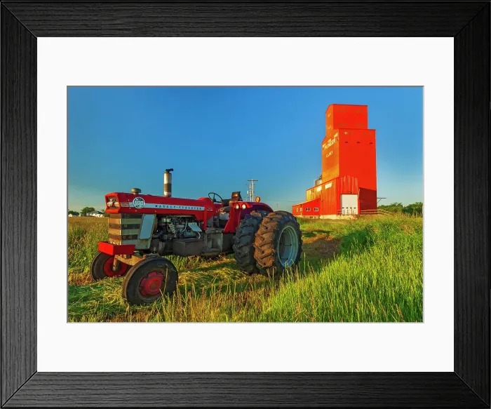 Framed Print : Grain elevator and tractor at sunrise. Carey, Manitoba, Canada Framed Print : Grain elevator and tractor at sunrise. Carey, Manitoba, Canada