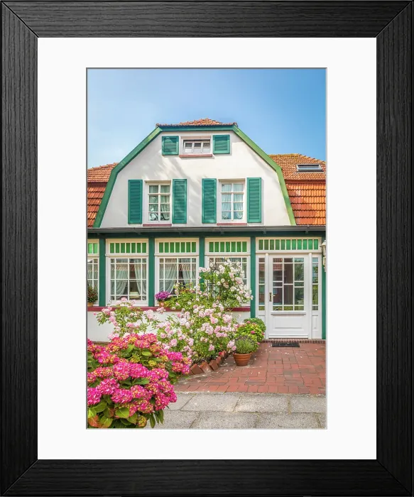 Framed Print : Traditional house in the village center of Spiekeroog, East Frisian Islands, East Frisia, Lower Saxony, Germany Framed Print : Traditional house in the village center of Spiekeroog, East Frisian Islands, East Frisia, Lower Saxony, Germany