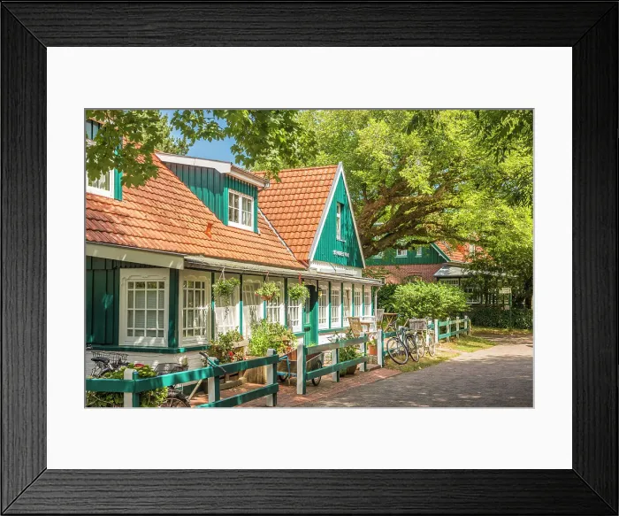 Framed Print : Traditional house in the village center of Spiekeroog, East Frisian Islands, East Frisia, Lower Saxony, Germany Framed Print : Traditional house in the village center of Spiekeroog, East Frisian Islands, East Frisia, Lower Saxony, Germany