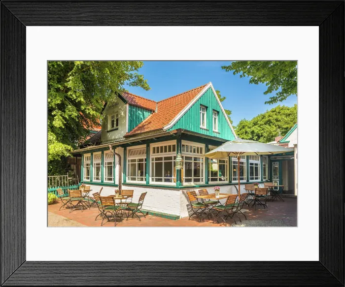 Framed Print : Traditional restaurant in the village center of Spiekeroog, East Frisian Islands, East Frisia, Lower Saxony, Germany Framed Print : Traditional restaurant in the village center of Spiekeroog, East Frisian Islands, East Frisia, Lower Saxony, Germany