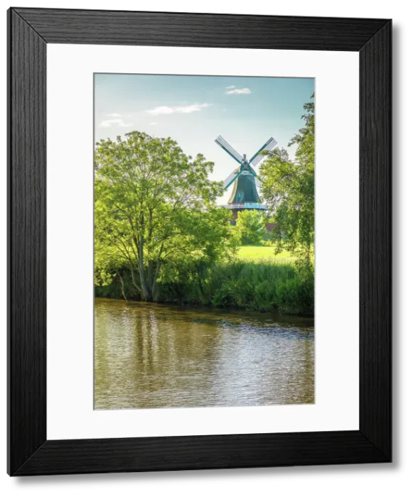 Framed Print : Canal with Green Mill, Greetsiel, East Frisia, Lower Saxony, Germany Framed Print : Canal with Green Mill, Greetsiel, East Frisia, Lower Saxony, Germany