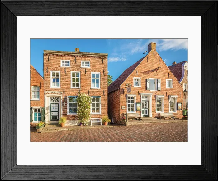Framed Print : Historic brick houses at the harbor in Greetsiel, East Frisia, Lower Saxony, Germany Framed Print : Historic brick houses at the harbor in Greetsiel, East Frisia, Lower Saxony, Germany