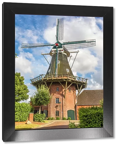 Windmill in the village of Rysum, Krummhoern, East Frisia, Lower Saxony, Germany