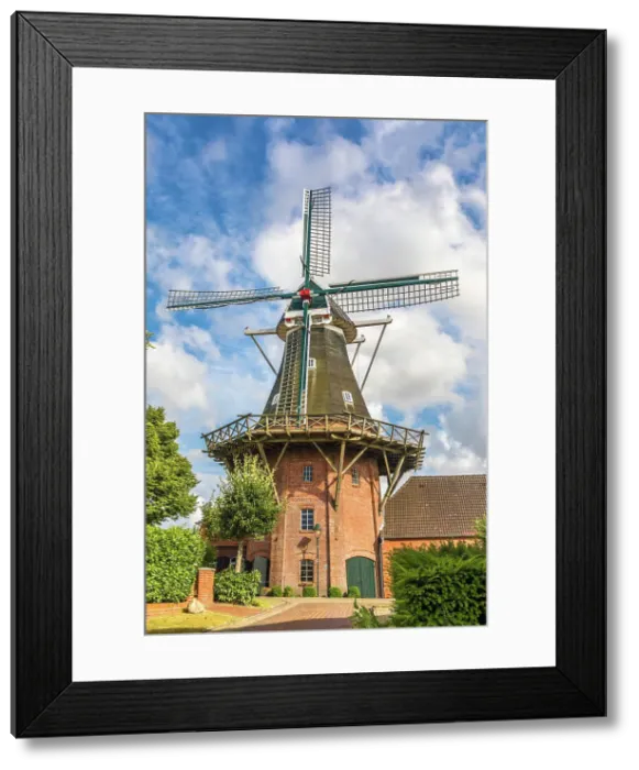 Framed Print : Windmill in the village of Rysum, Krummhoern, East Frisia, Lower Saxony, Germany Framed Print : Windmill in the village of Rysum, Krummhoern, East Frisia, Lower Saxony, Germany