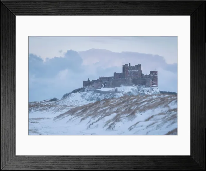 Framed Print : Snow covered beach and dunes on a wintry day at Bamburgh Castle in Northumberland, England. Winter (February) 2018 Framed Print : Snow covered beach and dunes on a wintry day at Bamburgh Castle in Northumberland, England. Winter (February) 2018