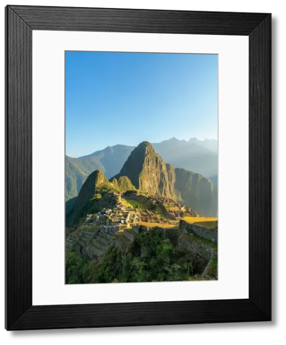 Framed Print : Historic ancient archeological Incan Machu Picchu on mountain in Andes at sunrise, Cuzco Region, Peru Framed Print : Historic ancient archeological Incan Machu Picchu on mountain in Andes at sunrise, Cuzco Region, Peru