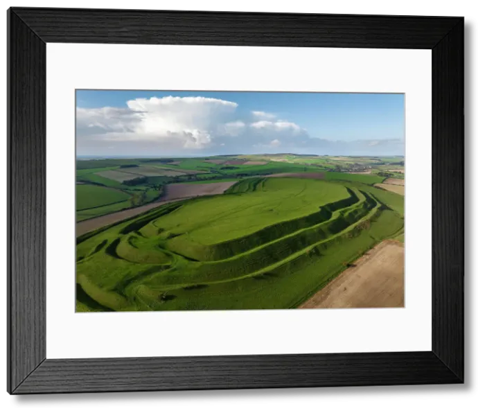 Framed Print : Aerial view of Maiden Castle, the largest Iron Age Hillfort in Britain near Dorchester, Dorset, England. Autumn (October) 2023 Framed Print : Aerial view of Maiden Castle, the largest Iron Age Hillfort in Britain near Dorchester, Dorset, England. Autumn (October) 2023