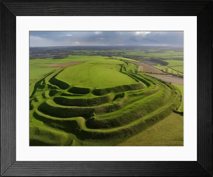Framed Print : Aerial view of Maiden Castle, the largest Iron Age Hillfort in Britain near Dorchester, Dorset, England. Autumn (October) 2023 Framed Print : Aerial view of Maiden Castle, the largest Iron Age Hillfort in Britain near Dorchester, Dorset, England. Autumn (October) 2023