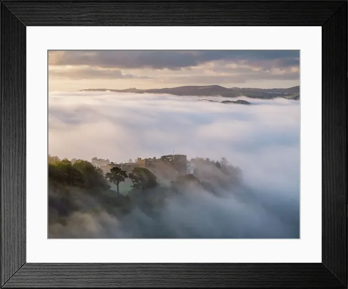 Framed Print : Aerial view of Castle Drogo emerging from a sea of morning mist, Dartmoor National Park, Devon, England. Autumn (October) 2023 Framed Print : Aerial view of Castle Drogo emerging from a sea of morning mist, Dartmoor National Park, Devon, England. Autumn (October) 2023