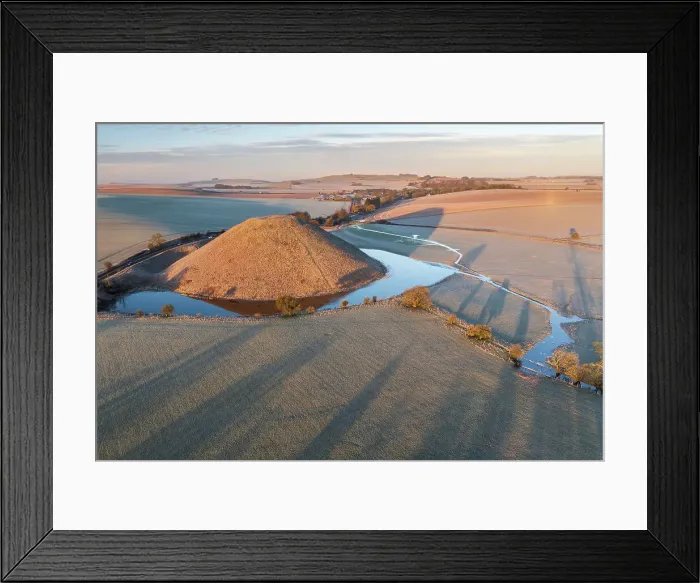 Framed Print : Aerial view of Neolithic Silbury Hill on a frosty morning, Avebury, Wiltshire, England. Winter (February) 2023