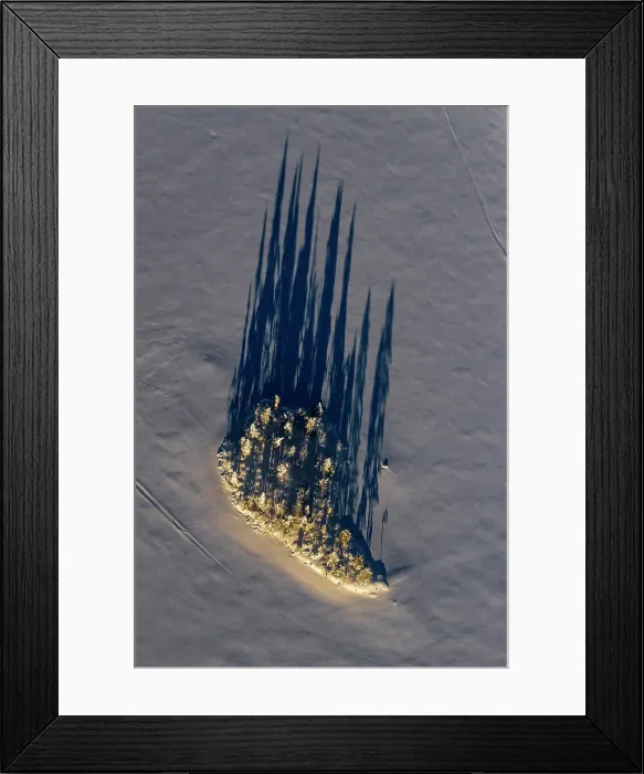 Framed Print : Aerial of island in frozen lake, Kuusamo, Finland Framed Print : Aerial of island in frozen lake, Kuusamo, Finland
