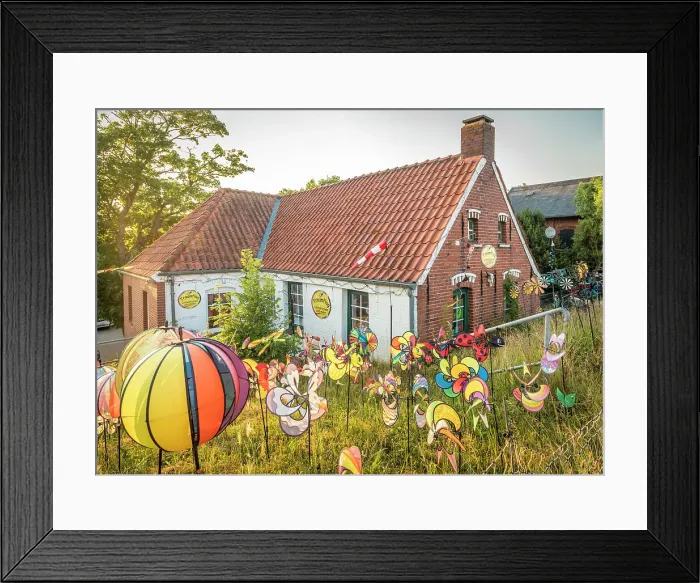Framed Print : Funny colorful wind chimes at the dike house in Greetsiel, East Frisia, Lower Saxony, Germany Framed Print : Funny colorful wind chimes at the dike house in Greetsiel, East Frisia, Lower Saxony, Germany