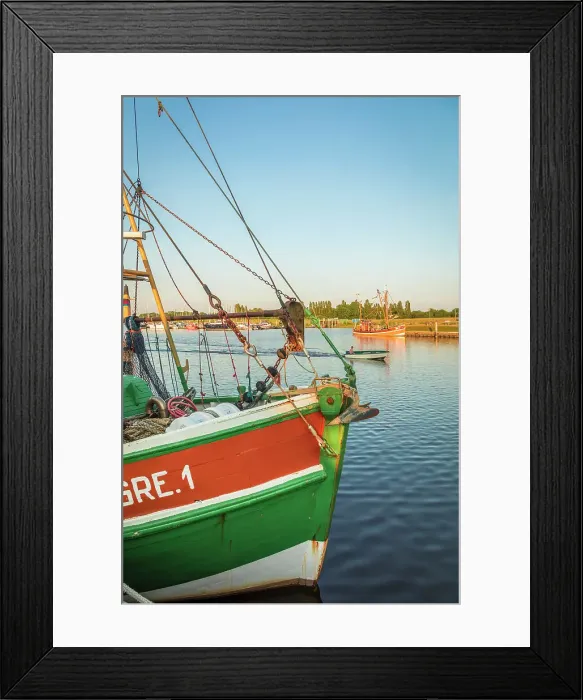 Framed Print : Shrimp boats in the harbor of Greetsiel at sunset, East Frisia, Lower Saxony, Germany