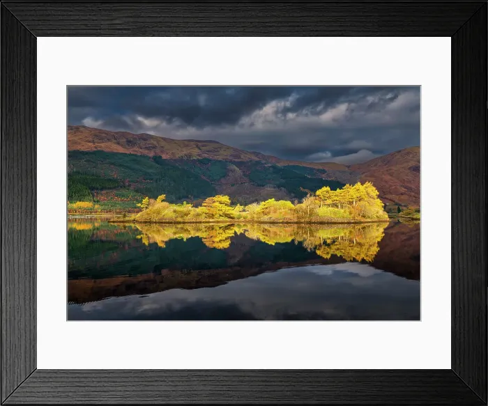 Framed Print : Sunlight Illuminating Eilean Munde Island, Loch Leven, Highland Region, Scotland Framed Print : Sunlight Illuminating Eilean Munde Island, Loch Leven, Highland Region, Scotland