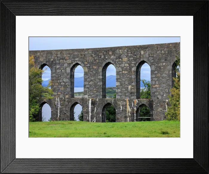 Framed Print : The Walls of McCaig's Tower on Battery Hill overlooking Oban with the Scoittish Highlands beyond, Oban, Scotland, UK Framed Print : The Walls of McCaig's Tower on Battery Hill overlooking Oban with the Scoittish Highlands beyond, Oban, Scotland, UK