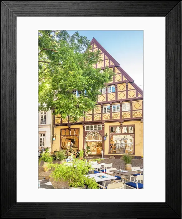 Framed Print : Street cafes and Degodehaus in the old town of Oldenburg, Oldenburger Land, Lower Saxony, Germany Framed Print : Street cafes and Degodehaus in the old town of Oldenburg, Oldenburger Land, Lower Saxony, Germany