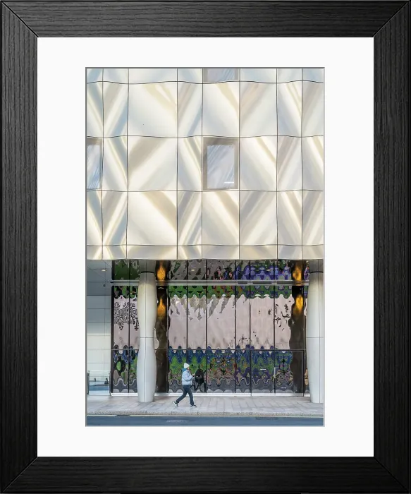 Framed Print : Woman walking past The Quay Club, Canary Wharf, London, England, UK Framed Print : Woman walking past The Quay Club, Canary Wharf, London, England, UK