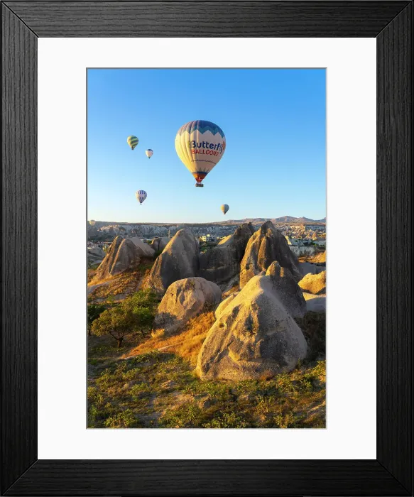 Framed Print : Aerial view of hot air balloon over rock formations at sunrise, Goreme, Goreme Historical National Park, Nevsehir District, Nevsehir Province, UNESCO, Cappadocia, Central Anatolia Region, Turkey Framed Print : Aerial view of hot air balloon over rock formations at sunrise, Goreme, Goreme Historical National Park, Nevsehir District, Nevsehir Province, UNESCO, Cappadocia, Central Anatolia Region, Turkey