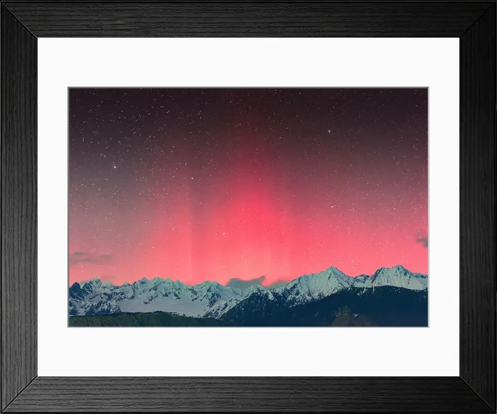 Framed Print : Bright colorful sky with Aurora Borealis over snowcapped mountains, Val Masino, Valtellina, Sondrio province, Lombardy, Italy
