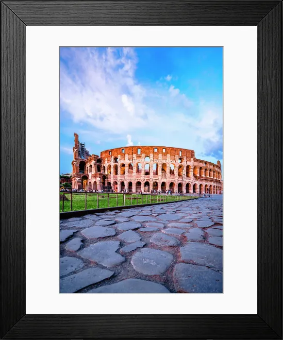 Framed Print : Sunset over the Coliseum view from famous empty cobblestoned Via Sacra, Rome, Italy Framed Print : Sunset over the Coliseum view from famous empty cobblestoned Via Sacra, Rome, Italy
