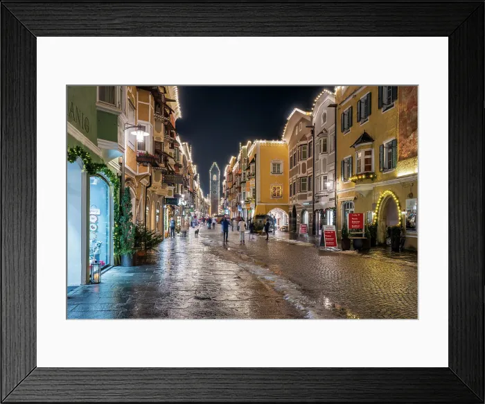 Framed Print : Night view of the main street and Zwolferturm medieval tower decorated with Christmas lights, Sterzing-Vipiteno, South Tyrol, Italy Framed Print : Night view of the main street and Zwolferturm medieval tower decorated with Christmas lights, Sterzing-Vipiteno, South Tyrol, Italy