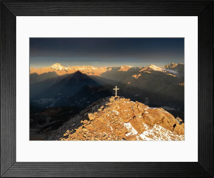 Framed Print : Aerial view of the crucifix on the top of Pizzo Scalino with view on the Mount Disgrazia at sunrise. Valmalenco, Valtellina, Lombardy, Italy Framed Print : Aerial view of the crucifix on the top of Pizzo Scalino with view on the Mount Disgrazia at sunrise. Valmalenco, Valtellina, Lombardy, Italy