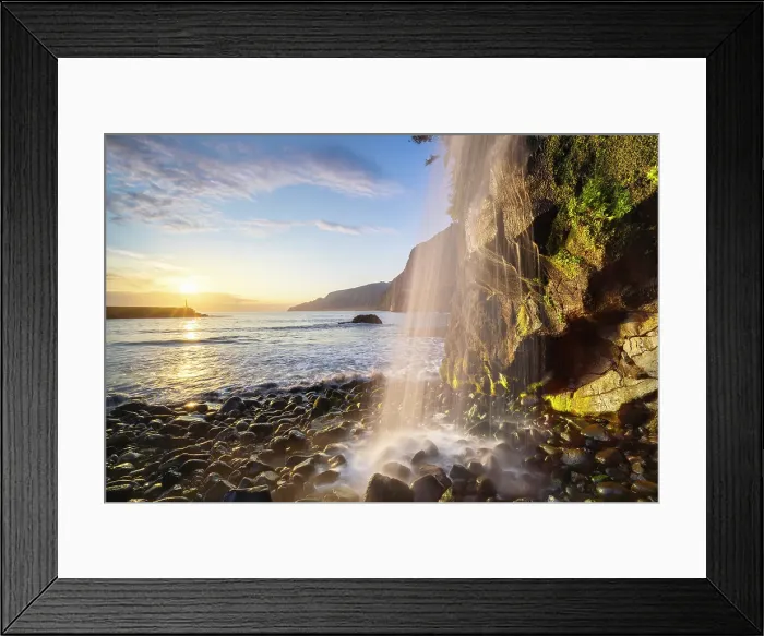 Framed Print : A waterfall in Seixal black sand beach during sunrise, Seixal, Porto Moniz, Madeira, Portugal Framed Print : A waterfall in Seixal black sand beach during sunrise, Seixal, Porto Moniz, Madeira, Portugal