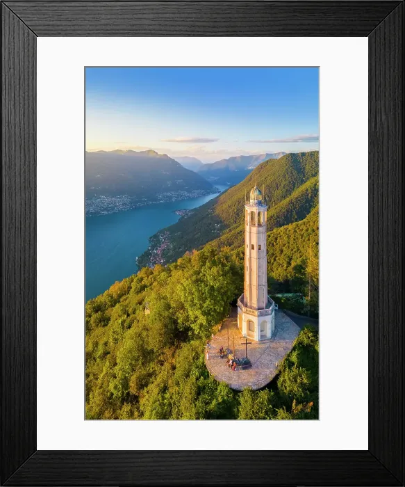 Framed Print : Aerial view of the Faro Voltiano (Volta Lighthouse) of Brunate overlooking Como and Como Lake in summer at sunset. Brunate, Province of Como, Lombardy, Italy Framed Print : Aerial view of the Faro Voltiano (Volta Lighthouse) of Brunate overlooking Como and Como Lake in summer at sunset. Brunate, Province of Como, Lombardy, Italy