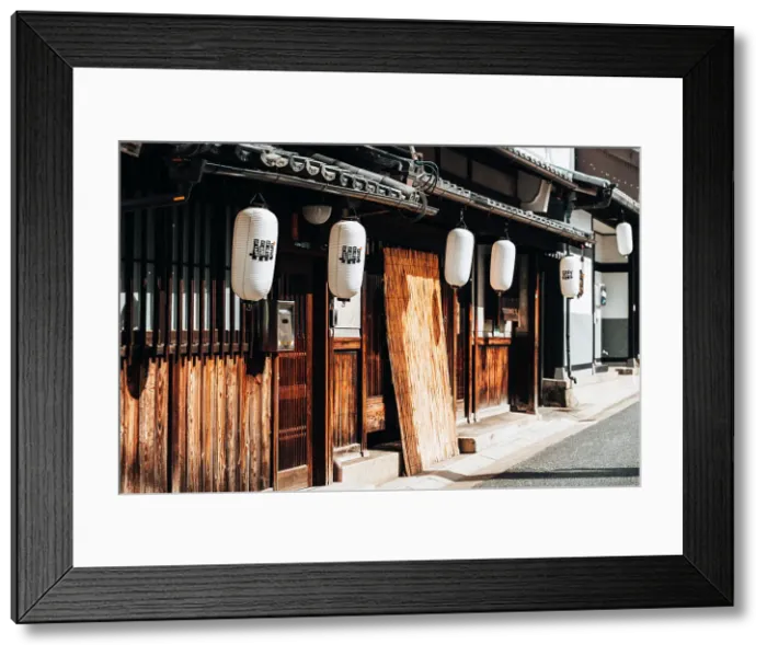 Framed Print : Wooden facades and lanterns in the streets of Nara, Japan