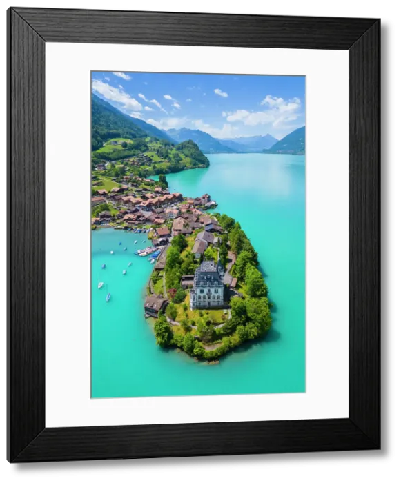 Framed Print : Aerial view of the village of Iseltwald and it's peninsula with the old Castle on Lake Brienz. Iseltwald, Lake Brienz, Bernese Oberland, Interlaken-Oberhasli district, Canton of Bern, Switzerland Framed Print : Aerial view of the village of Iseltwald and it's peninsula with the old Castle on Lake Brienz. Iseltwald, Lake Brienz, Bernese Oberland, Interlaken-Oberhasli district, Canton of Bern, Switzerland