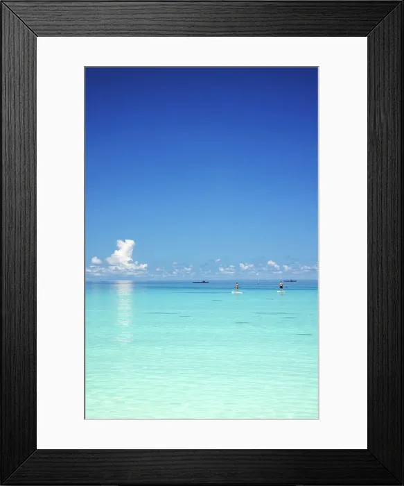 Framed Print : Paddleboarders in the turquoise waters of the Indian Ocean, North Ari Atoll, the Maldives Framed Print : Paddleboarders in the turquoise waters of the Indian Ocean, North Ari Atoll, the Maldives