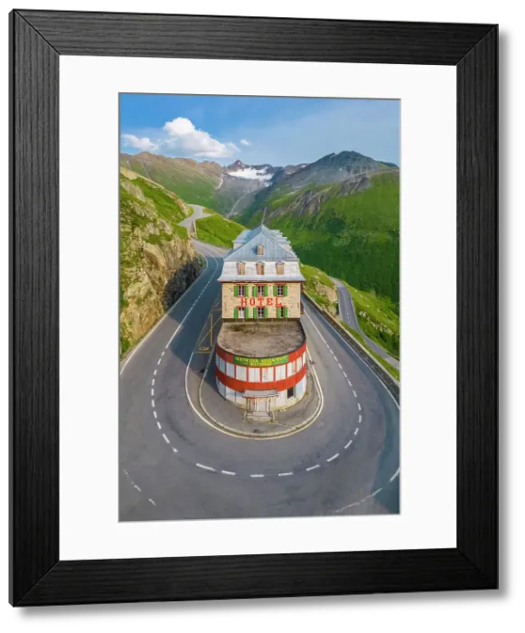 Framed Print : Aerial view of the Belvedere Hotel and the Furka Pass road, famous for a scene of the James Bond film Goldfinger, a high mountain pass in the Swiss Alps connecting Gletsch, Valais with Realp, Uri. Obergoms, Canton of Valais, Swiss Alps, Switzerland Framed Print : Aerial view of the Belvedere Hotel and the Furka Pass road, famous for a scene of the James Bond film Goldfinger, a high mountain pass in the Swiss Alps connecting Gletsch, Valais with Realp, Uri. Obergoms, Canton of Valais, Swiss Alps, Switzerland