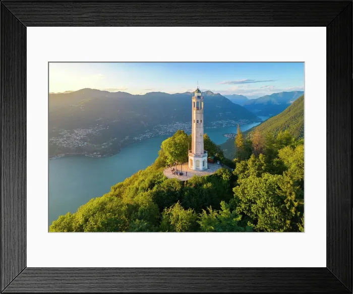 Framed Print : Aerial view of the Faro Voltiano (Volta Lighthouse) of Brunate overlooking Como and Como Lake in summer at sunset. Brunate, Province of Como, Lombardy, Italy Framed Print : Aerial view of the Faro Voltiano (Volta Lighthouse) of Brunate overlooking Como and Como Lake in summer at sunset. Brunate, Province of Como, Lombardy, Italy