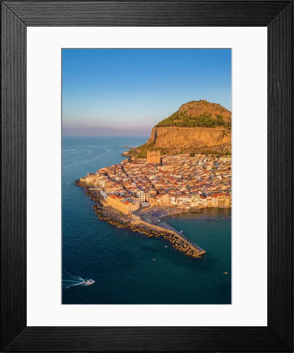 Framed Print : Aerial view of the ancient town of Cefalu, Unesco World Heritage site, at sunset. Palermo district, Sicily, Italy Framed Print : Aerial view of the ancient town of Cefalu, Unesco World Heritage site, at sunset. Palermo district, Sicily, Italy