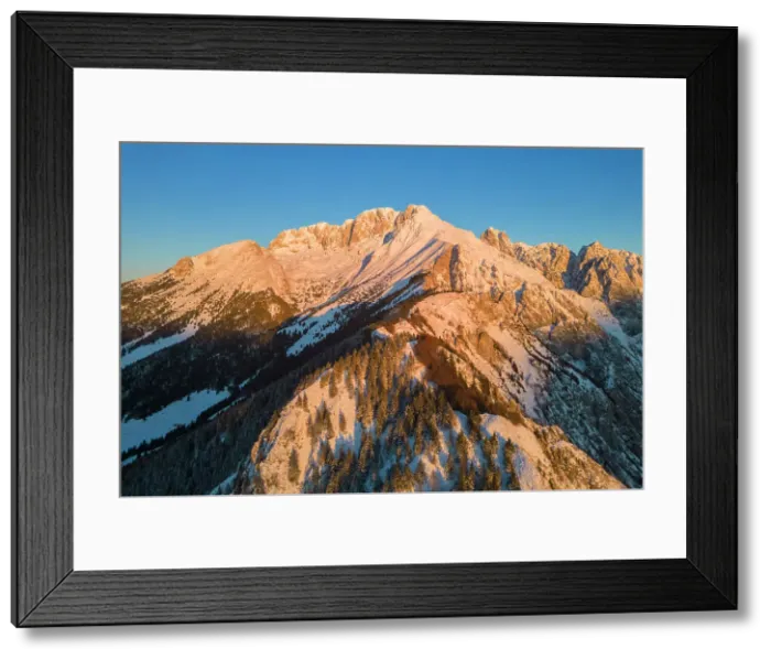 Framed Print : Aerial view of Monte Gulter and the Presolana massif after a winter snowfall at sunrise. Presolana pass, Castione della Presolana, Seriana Valley, Bergamo province, Lombardy, Italy Framed Print : Aerial view of Monte Gulter and the Presolana massif after a winter snowfall at sunrise. Presolana pass, Castione della Presolana, Seriana Valley, Bergamo province, Lombardy, Italy