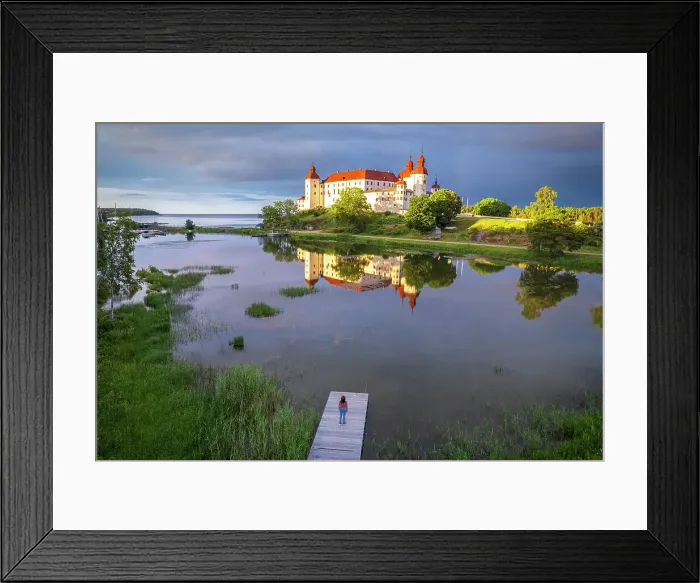 Framed Print : One tourist standing on the river of Vanem lake admires Lacko castle at sunset, Kallandso island, Lidkoping municipality, Gotaland, Sweden Framed Print : One tourist standing on the river of Vanem lake admires Lacko castle at sunset, Kallandso island, Lidkoping municipality, Gotaland, Sweden