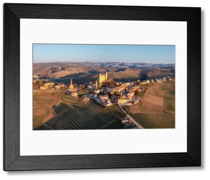 Framed Print : Aerial view of the medieval town of Serralunga D'Alba and its castle. Serralunga D'Alba, Barolo wine region, Langhe, Piedmont, Italy