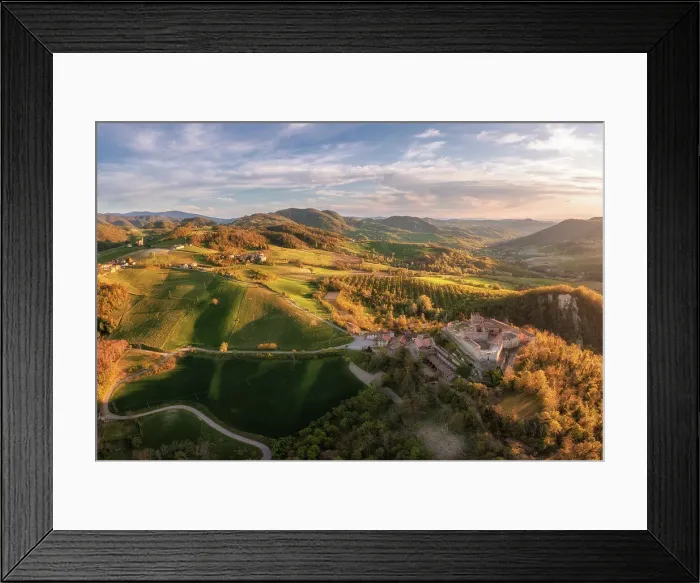 Framed Print : Aerial view of the Castle of Montesegale at sunset. Montesegale, Oltrepo wine region, Oltrepo, Lombardy, Italy