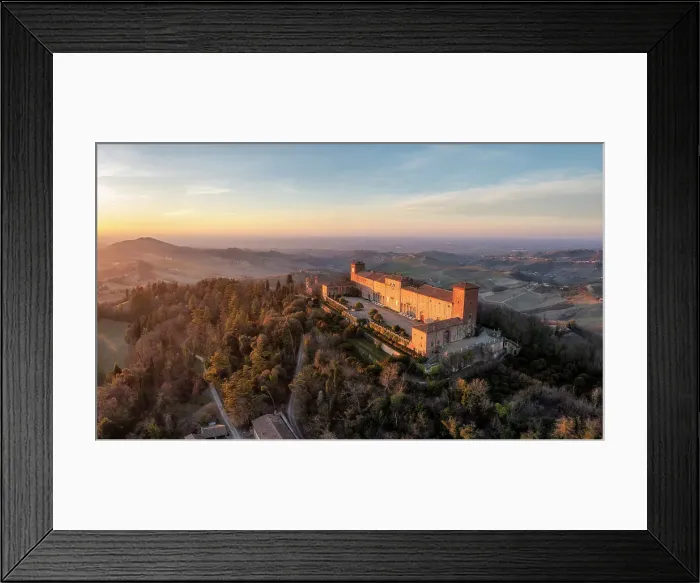 Framed Print : Aerial view of the Castle of Montalto Pavese at sunset. Montalto Pavese, Oltrepo wine region, Oltrepo, Lombardy, Italy