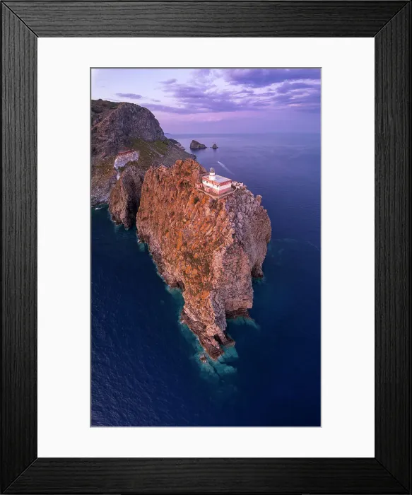 Framed Print : Panoramic aerial view of the lighthouse on top of a rocky cliff at dusk, Punta della Guardia, Ponza island, Pontine archipelago, Latium region, Italy Framed Print : Panoramic aerial view of the lighthouse on top of a rocky cliff at dusk, Punta della Guardia, Ponza island, Pontine archipelago, Latium region, Italy
