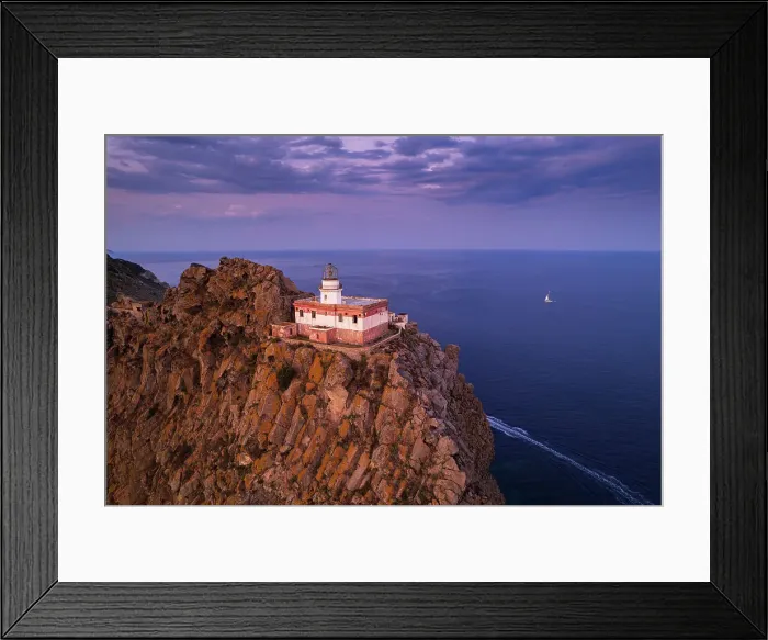 Framed Print : The Ponza's lighthouse on top of a volcanic cliff and surrounded by the sea at dusk, Ponza island, Pontine archipelago, Latium region, Italy Framed Print : The Ponza's lighthouse on top of a volcanic cliff and surrounded by the sea at dusk, Ponza island, Pontine archipelago, Latium region, Italy