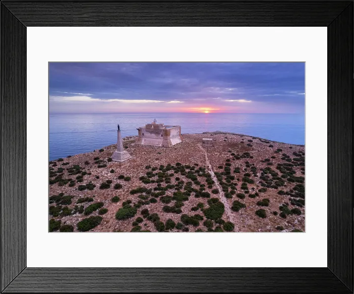 Framed Print : Capo Passero island at sunrise with the fortress in the foreground, Porto Palo di Capo Passero, Siracuse province, Sicily, Italy