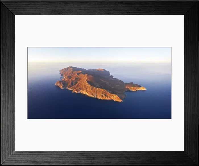 Framed Print : Aerial view of Capraia island at sunset, aerial view, Tuscan Archipelago National Park, Livorno province, Tuscany, Italy Framed Print : Aerial view of Capraia island at sunset, aerial view, Tuscan Archipelago National Park, Livorno province, Tuscany, Italy
