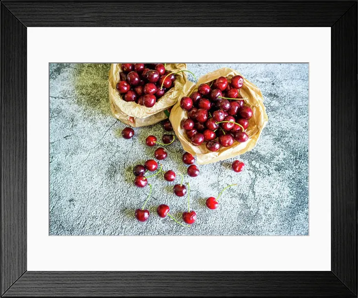 Framed Print : Red cherries ready to eat on a table, high angle view Framed Print : Red cherries ready to eat on a table, high angle view