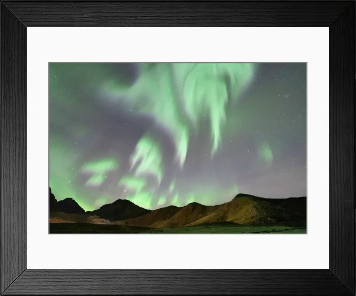 Framed Print : Aurora Borealis glowing over mountains, Haukland, Lofoten Islands, Norway Framed Print : Aurora Borealis glowing over mountains, Haukland, Lofoten Islands, Norway