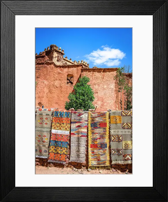 Framed Print : Handmade carpets for sale hanging outside the old ruins of Telouet Kasbah, High Atlas mountains, Morocco Framed Print : Handmade carpets for sale hanging outside the old ruins of Telouet Kasbah, High Atlas mountains, Morocco