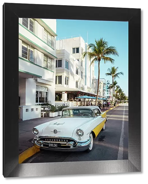 Oldsmobile Super 88 convertible parked in front of the Avalon Hotel, Ocean Drive, South Beach, Miami, Dade County, Florida, USA