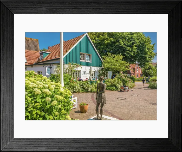 Framed Print : Bronze statue island girl and tea room in the village center of Spiekeroog, East Frisian Islands, East Frisia, Lower Saxony, Germany Framed Print : Bronze statue island girl and tea room in the village center of Spiekeroog, East Frisian Islands, East Frisia, Lower Saxony, Germany