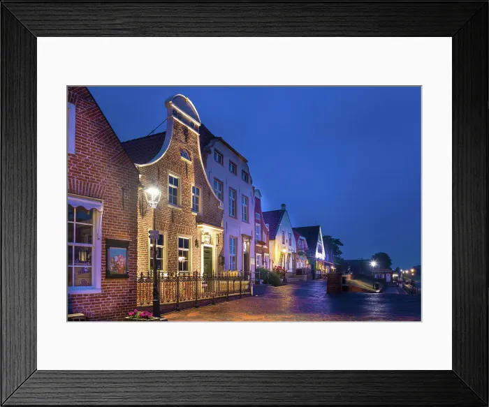 Framed Print : Historic brick houses at the harbor of Greetsiel at blue hour, East Frisia, Lower Saxony, Germany Framed Print : Historic brick houses at the harbor of Greetsiel at blue hour, East Frisia, Lower Saxony, Germany